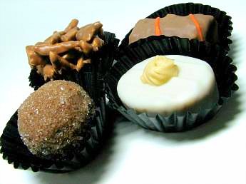 chocolate_truffles_2_by_tazzmaniac_o.jpg
