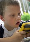 child_playing_video_game_100.jpg