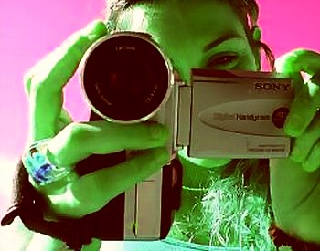 girl_with_camera_by_tsevis_fx4o.jpg